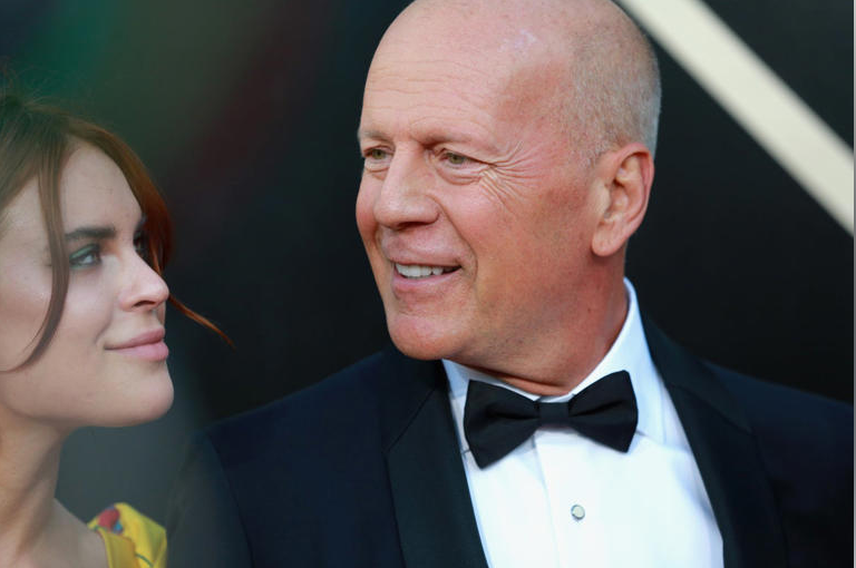 Bruce Willis embraces Tallulah in rare public appearance at wedding
