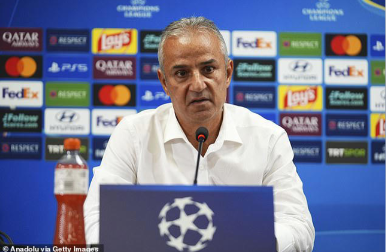 Fenerbahce manager quits after draw against Roma – as angry fan launches a bottle at him from stands