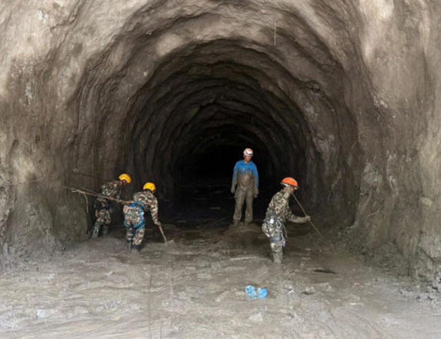 Dozens of trapped hydropower tunnel workers in Nepal could still be alive, official says