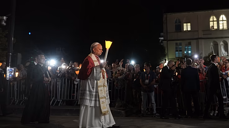 Pope joins pilgrims in Lourdes candlelit rosary as 150,000 attend mass