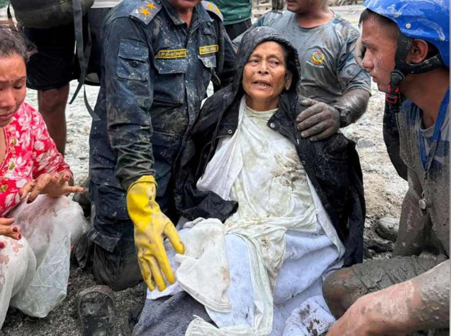 Chandika Kumari Shrestha was rescued from the rubble of her home long after she was presumed dead by her family following floods in Nepal (Picture: Reuters)